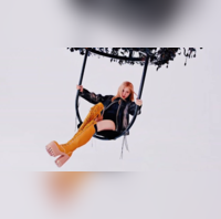 Blackpink's Rosé swings off the chandelier in striking kneehigh boots