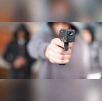 gun gunpoint robbery robber shooting gun violence