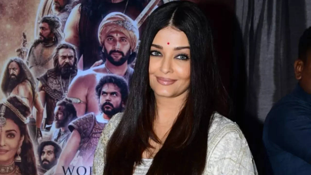 Aishwarya Rai Bachchan is a vision in white as she steps out to promote PS-1, but that red bindi has our hearts