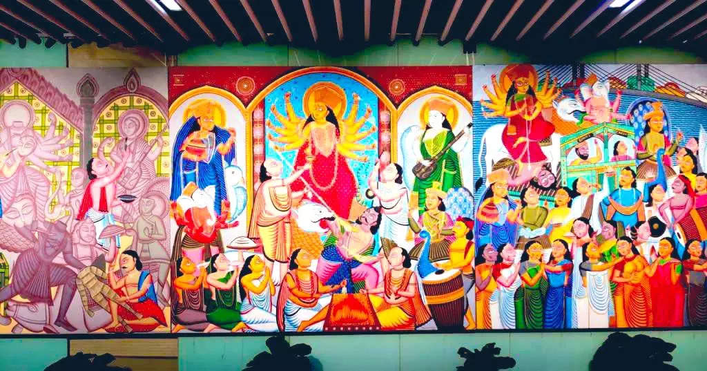 A mural depicting the stages of Durga Puja installed at Kolkata Airport