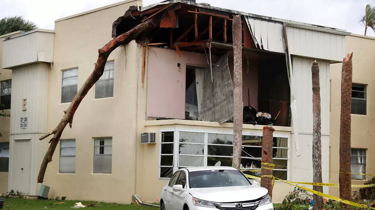A damaged apartment from an apparent overnight tornado spawned from Hurricane Ian at Kings Point 55+ community in Delray Beach, Florida.