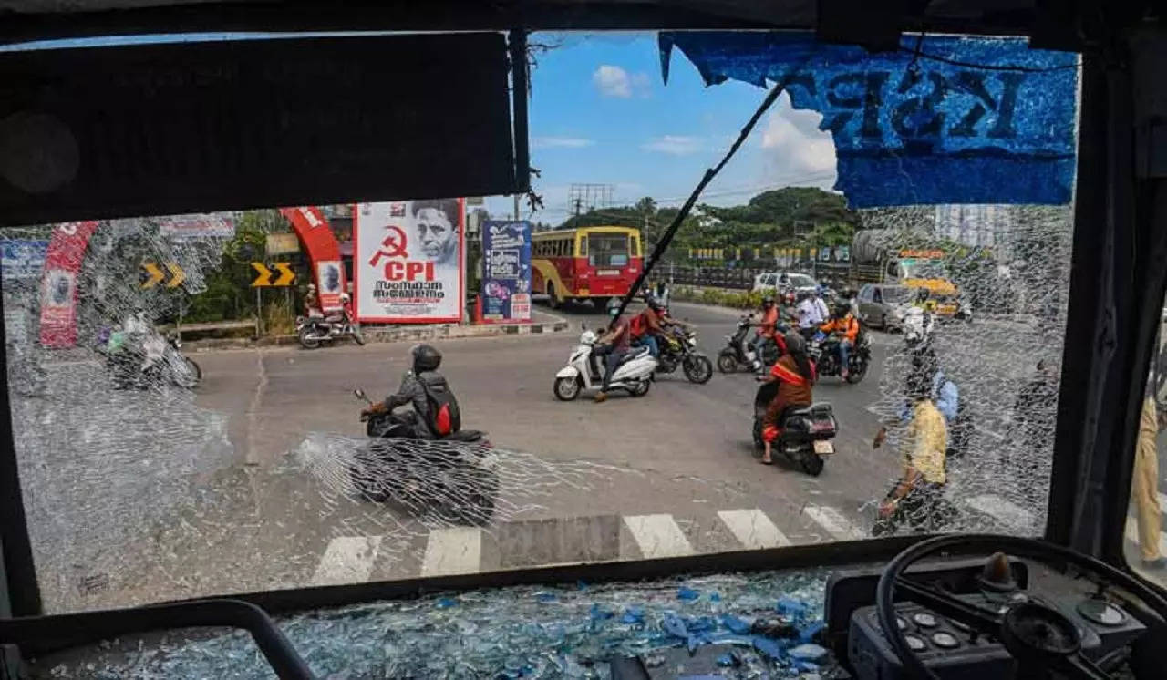 Broken windshield of a Kerala State Road Transport Corporation bus after some miscreants threw stones on it during a hartal called by the Popular Front of India