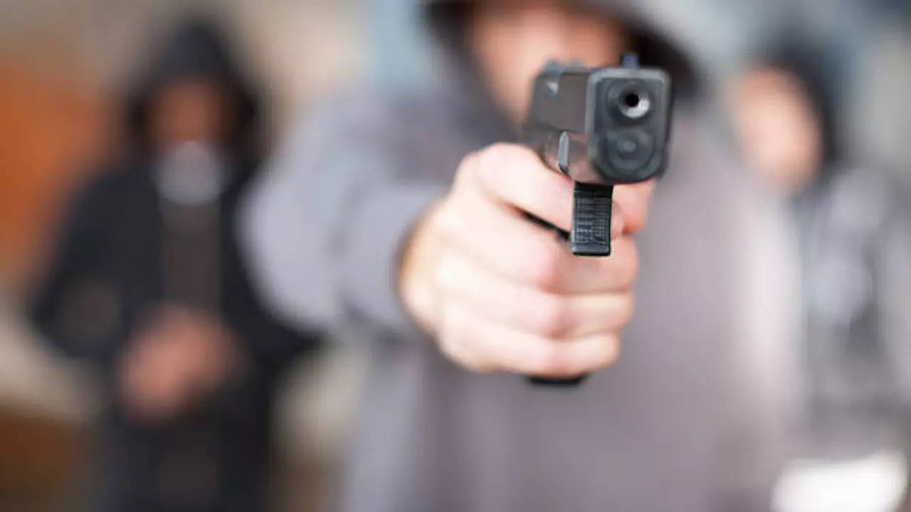 gun gunpoint robbery robber shooting gun violence