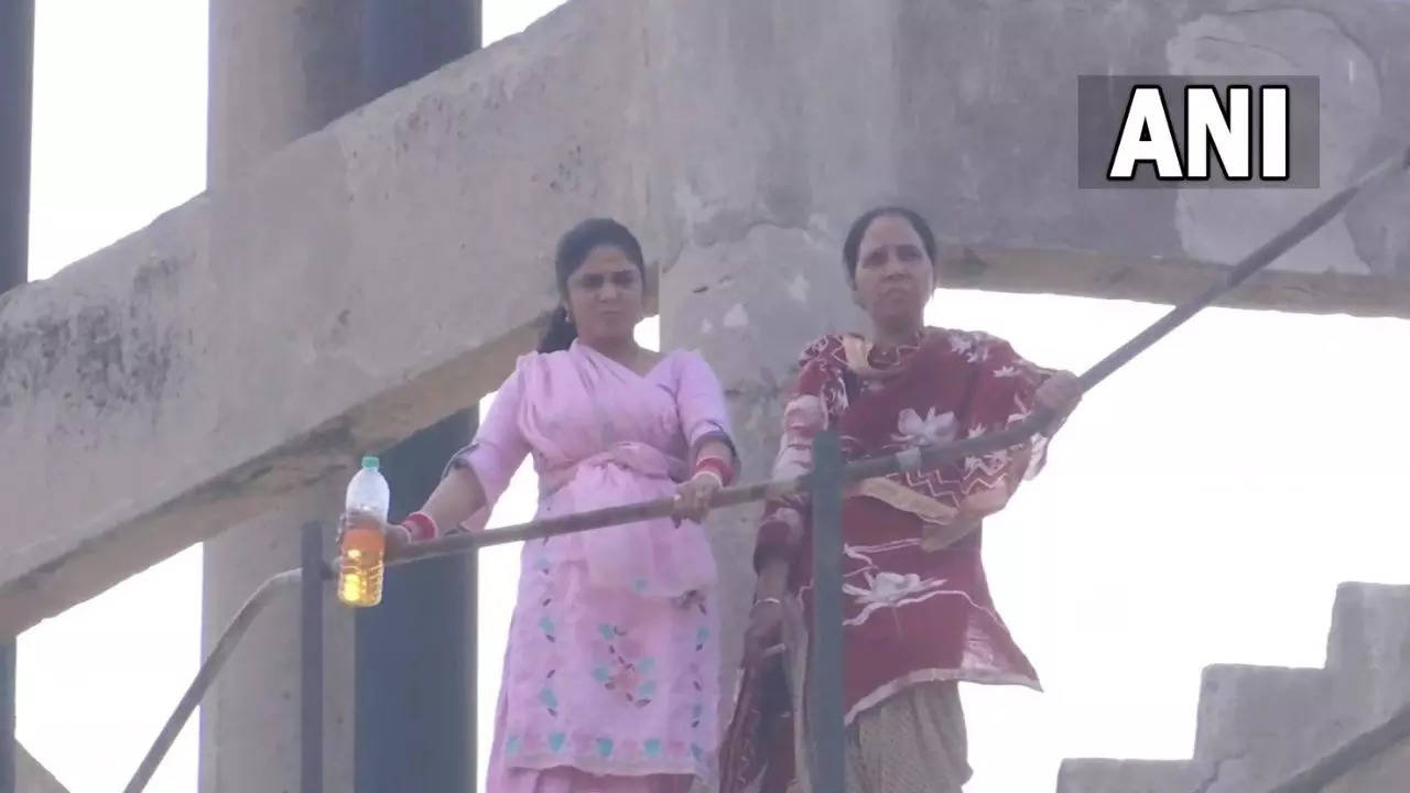 Demanding jobs in government schools two physical training teachers climbed a water tank in Mohali