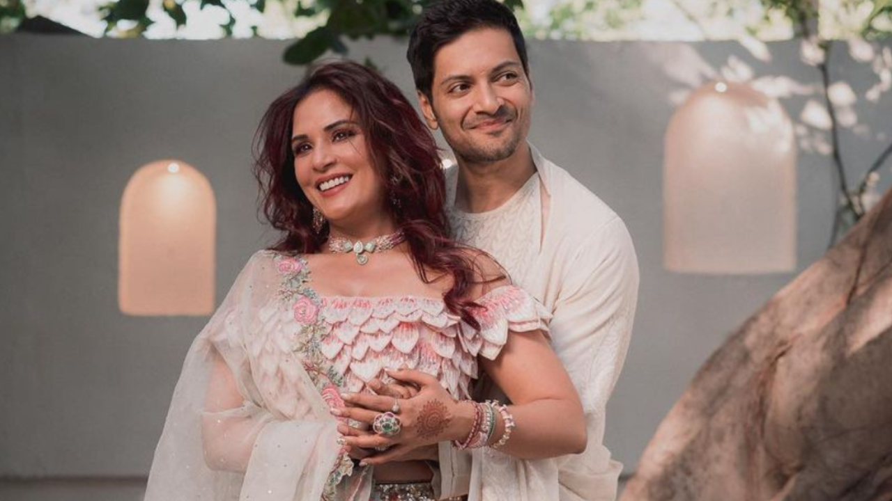 Richa Chaddha looks like a vision in white as she walks towards his groom Ali Fazal in UNSEEN video from the wedding
