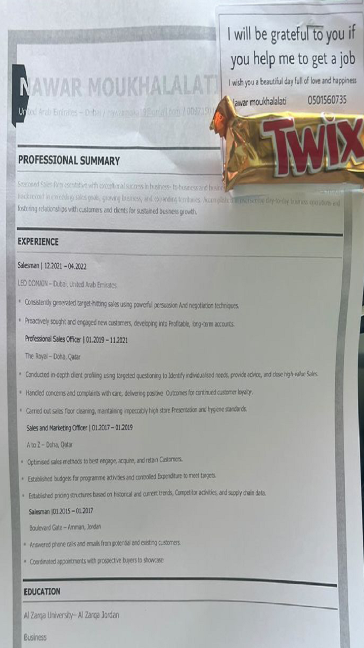 Dubai job seeker hands out resume with chocolates at traffic signal