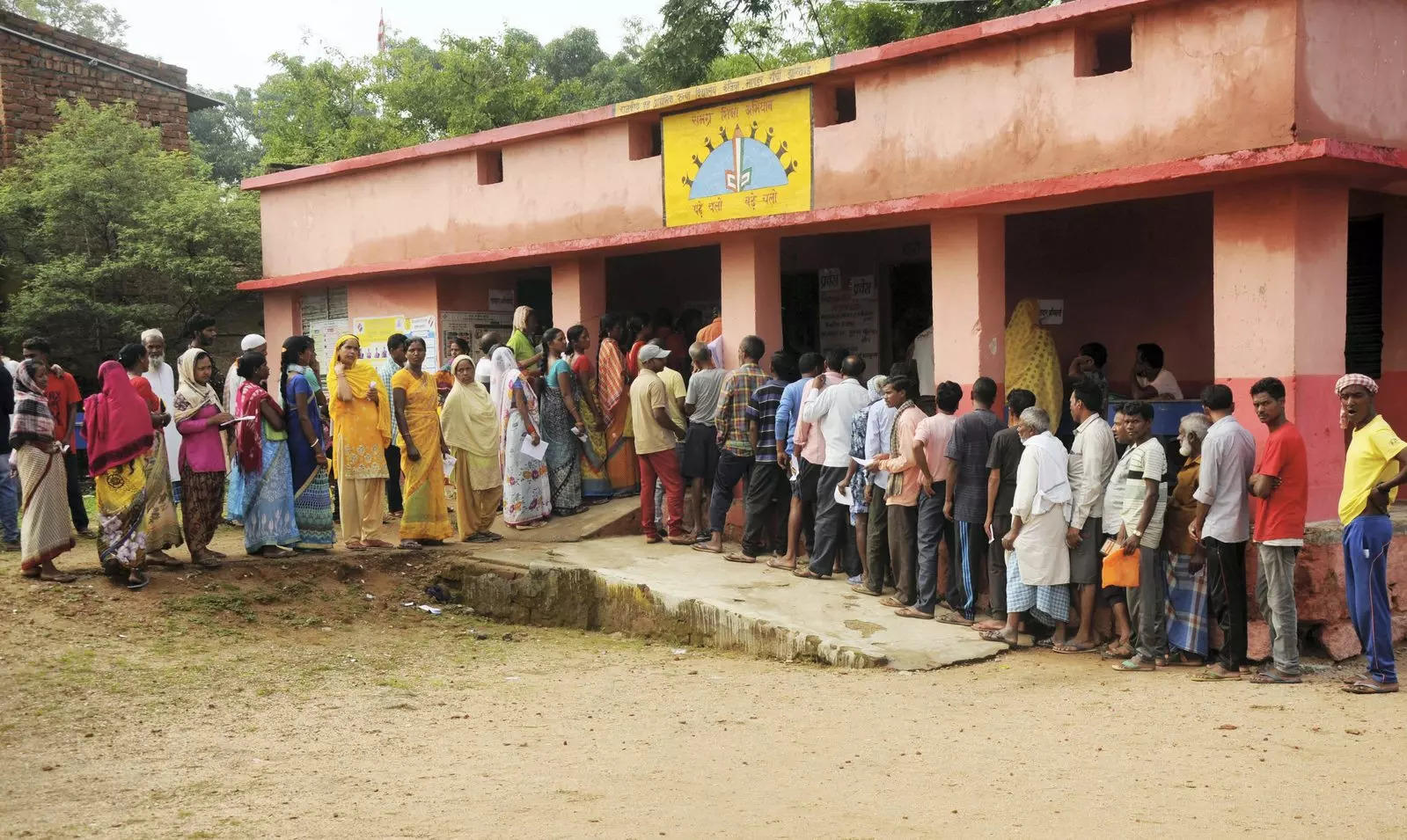 People wait in queues to cast votes at a polling station in Ranchi | Representational image