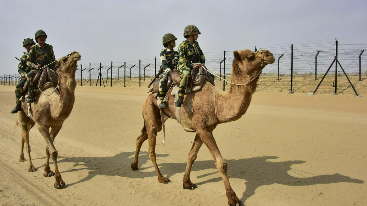 Border Security Force (BSF), mounted on camels, patrol along the India-Pakistan international border near Jaisalmer, Rajasthan (File Photo)