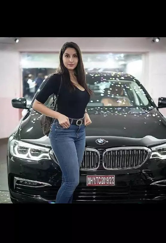 Nora Fatehi car collection - BMW 520D