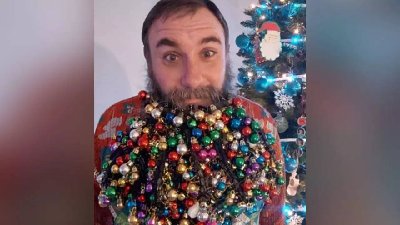 Man Hangs 710 Ornaments On Beard Sets World Record