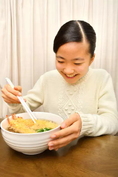 Eating with chopsticks