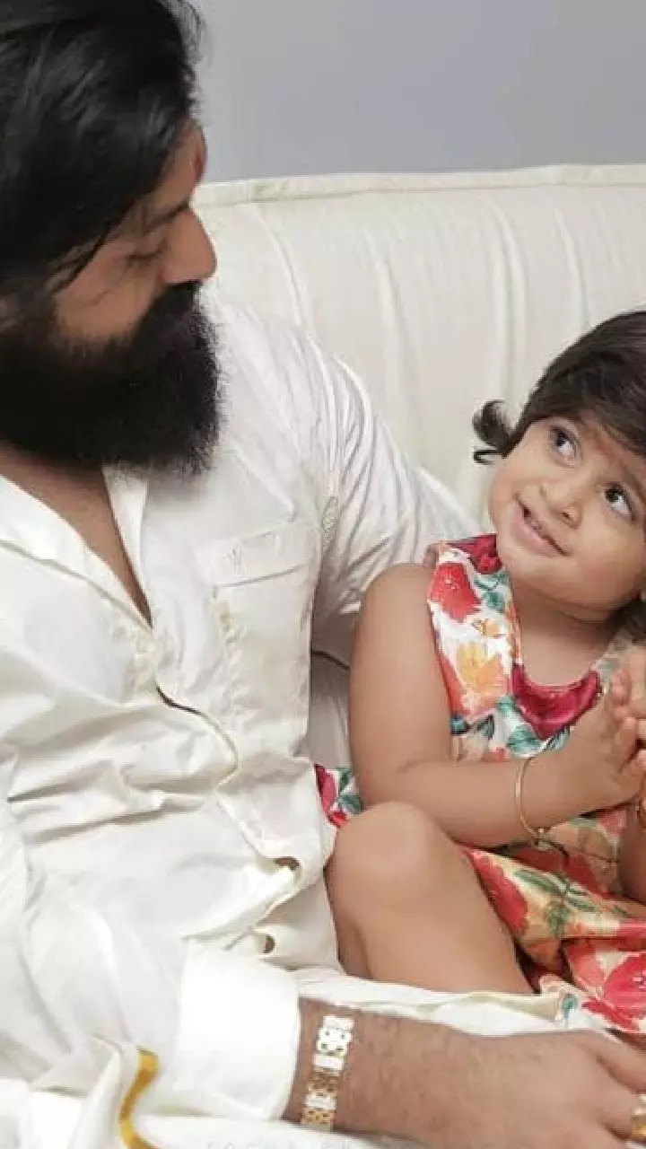 Yash with his little daughter