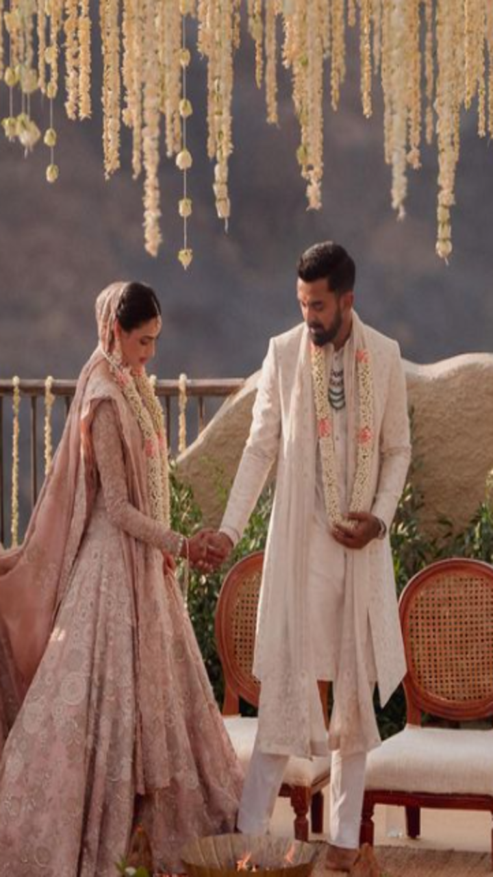 Athiya Shetty KL Rahul hold hands as they do the Pheras spiritual significance of this gesture