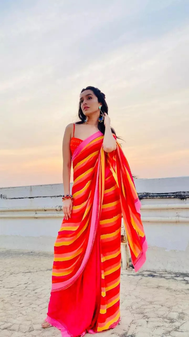 Shraddha poses in a saree on beach