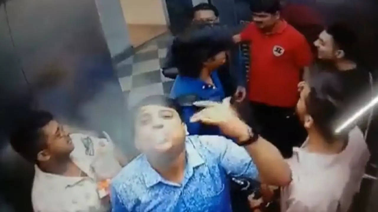 WATCH: Men caught smoking, drinking inside lift of Greater Noida society; 3  arrested after video goes viral