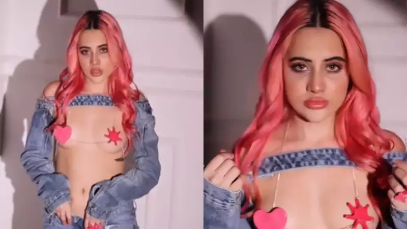 Hot pink! Uorfi Javed goes topless as she flaunts her new hair colour. Watch