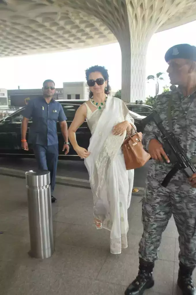 Kangana Ranaut in a white saree at the airport