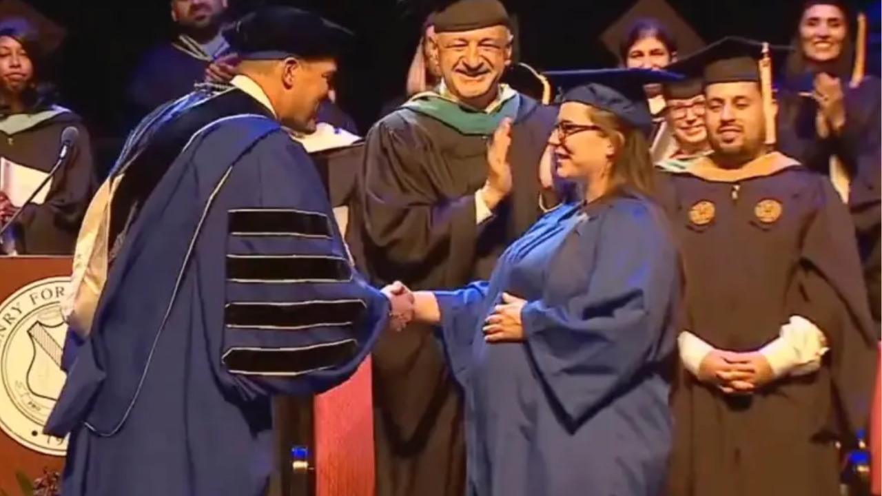 Kelsey Hudie receives her college diploma