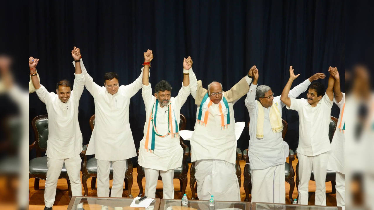 Congress President Mallikarjun Kharge with Siddaramaiah, DK Shivakumar