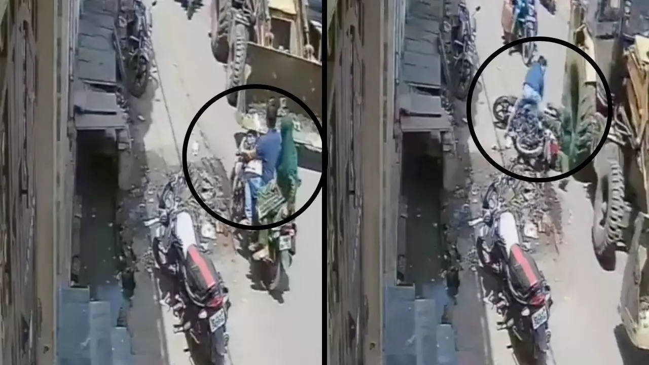 On Cctv Meerut Woman Narrowly Escapes Being Crushed By Jcb Viral Videos News Times Now