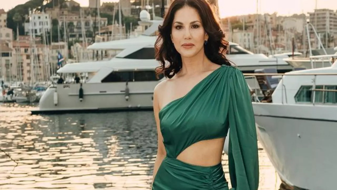 Cannes 2023: Sunny Leone oozes oomph in green one-shoulder thigh-high slit satin dress