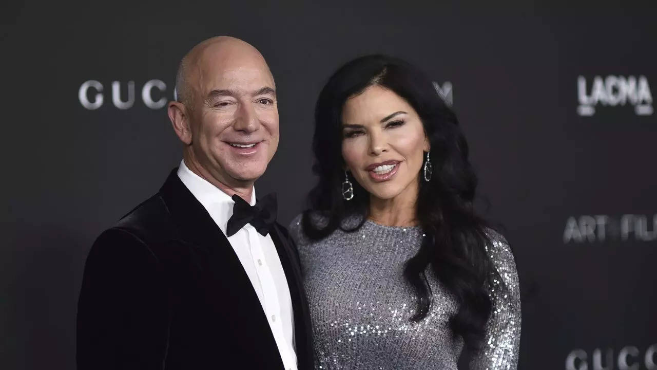 she said yes! amazon founder jeff bezos engaged to girlfriend lauren sanchez with a huge heart-shaped diamond