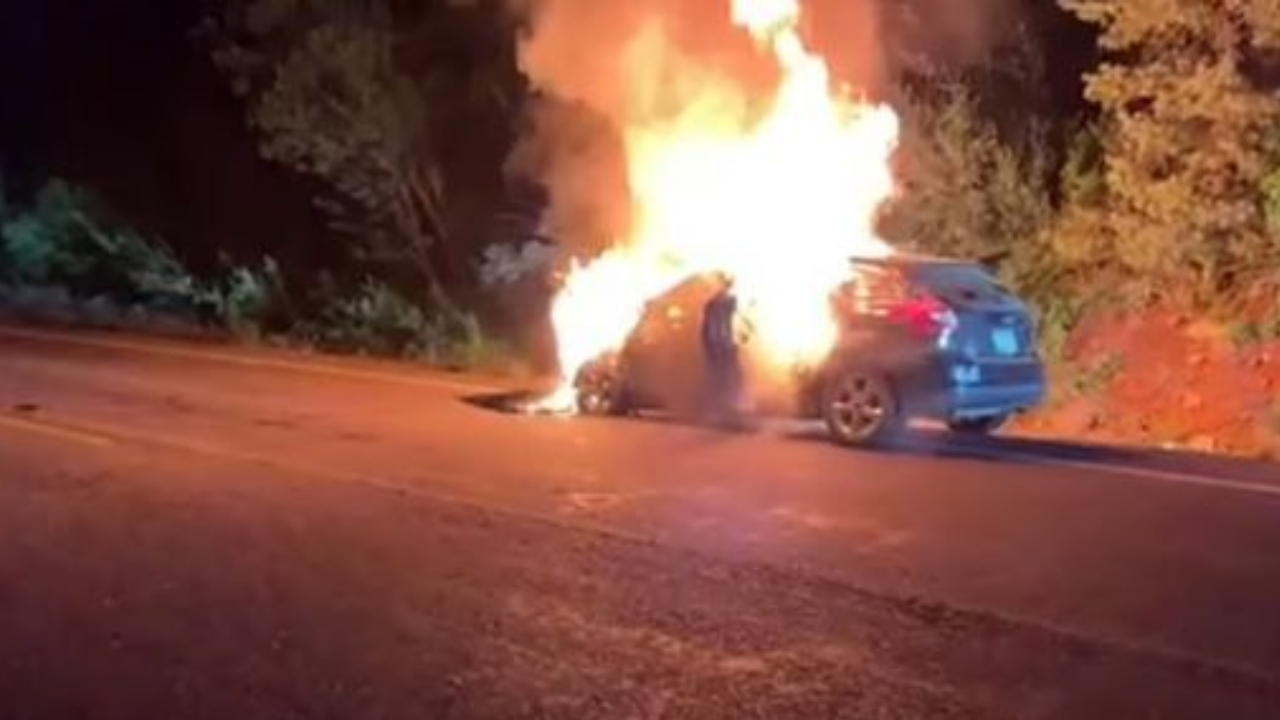 Man saves kids from burning car