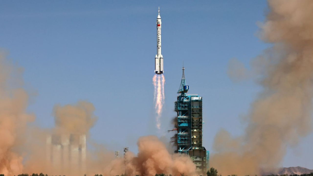 China poised to send its first civilian in space on Tuesday as a part ...