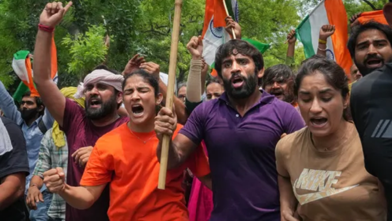 What are the charges against Vinesh Phogat, Bajrang Punia, Sakshee Malikkh