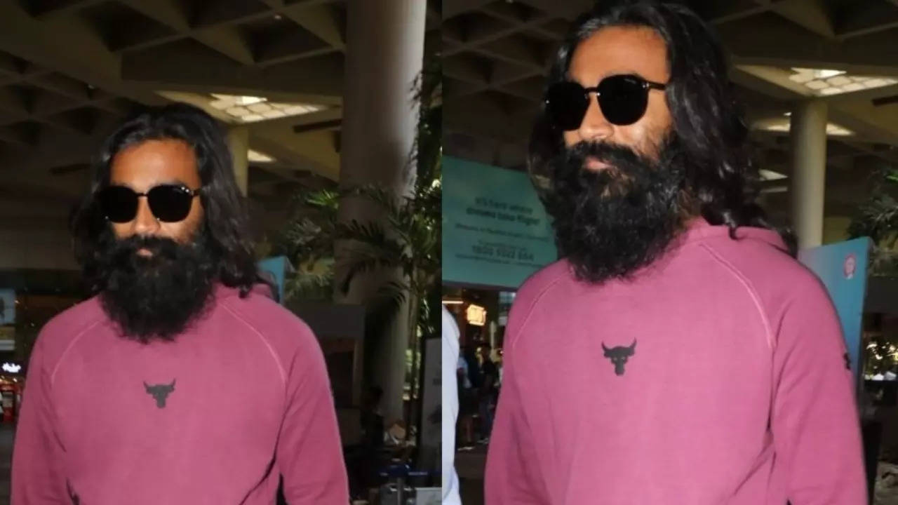 Dhanush flaunts his new look at Mumbai airport