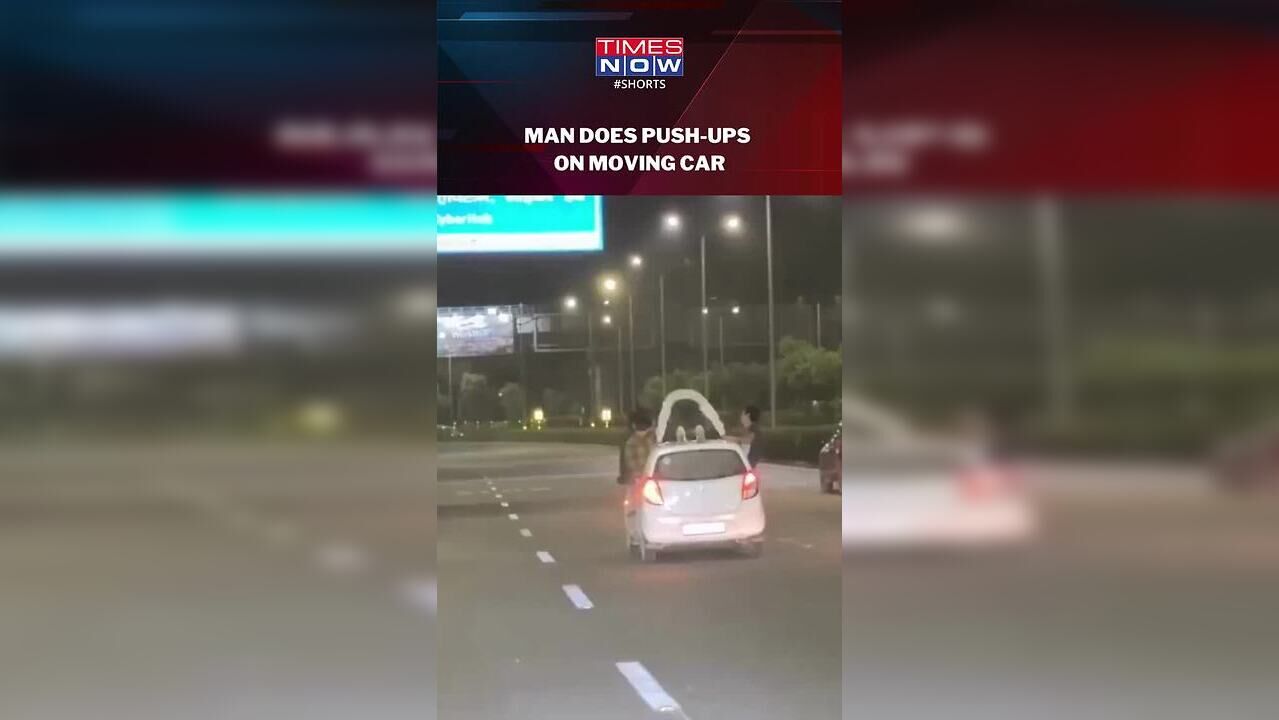 Watch! Gurugram Man Does Push-Ups On Top Of Moving Car, Faces Police Action