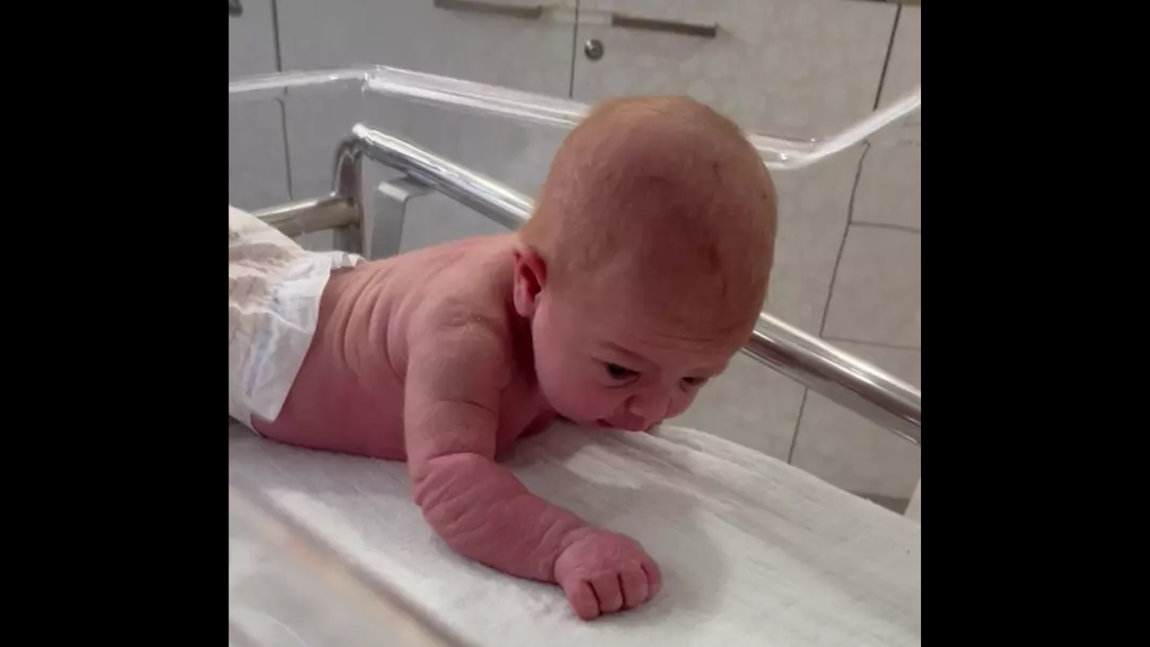 Baby starts crawling at 3 days old