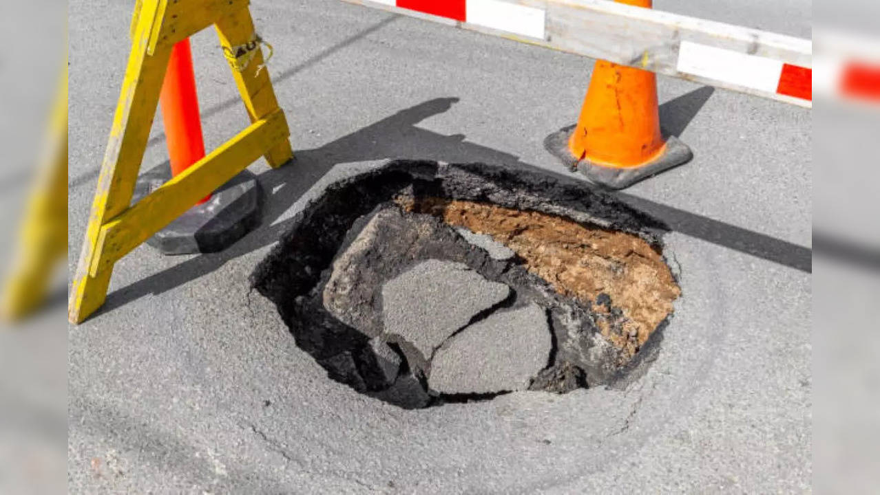 road cave in potholes