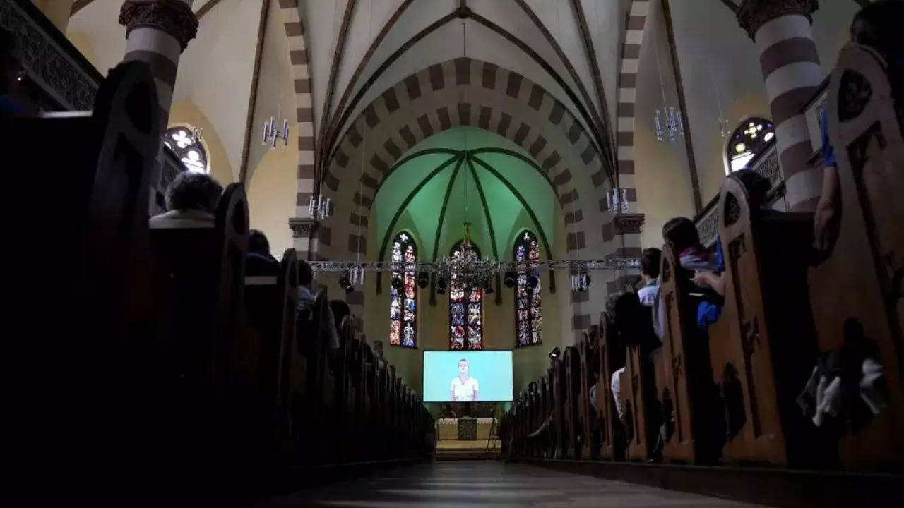 An avatar personifying ChatGPT leads a church service generated by AI in Fuerth, Germany