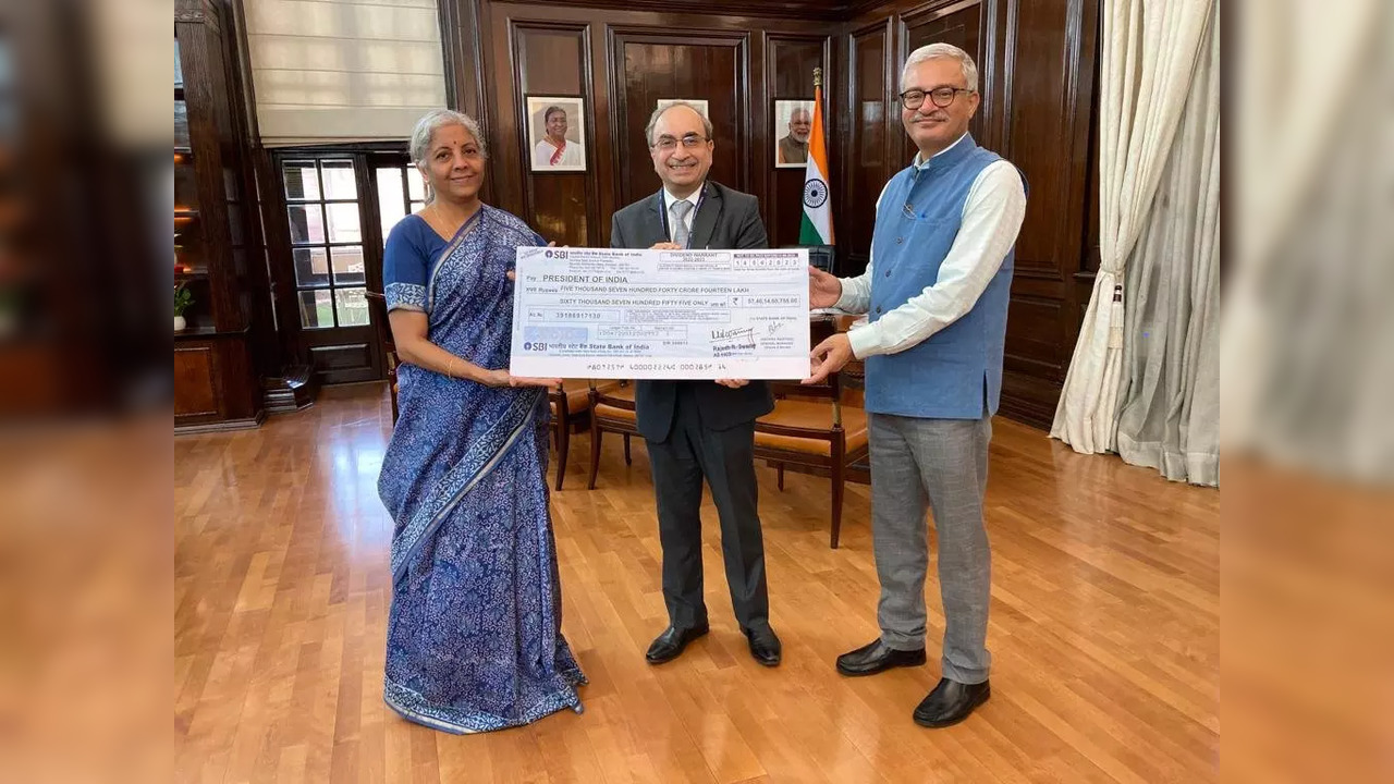 SBI Chairman Dinesh Khara hands over FY23 dividend cheque to FM Sitharman