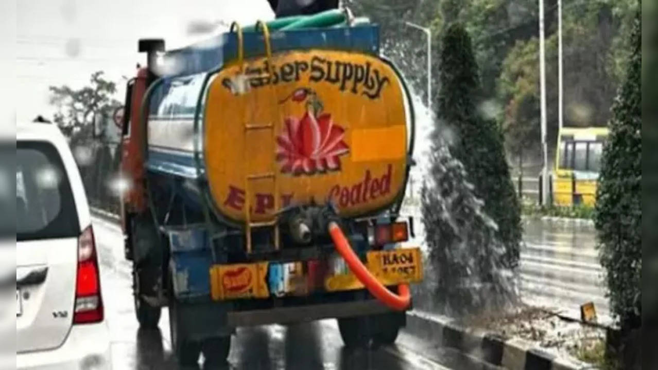 A photo of BBMP vehicle watering plants is going viral on social media