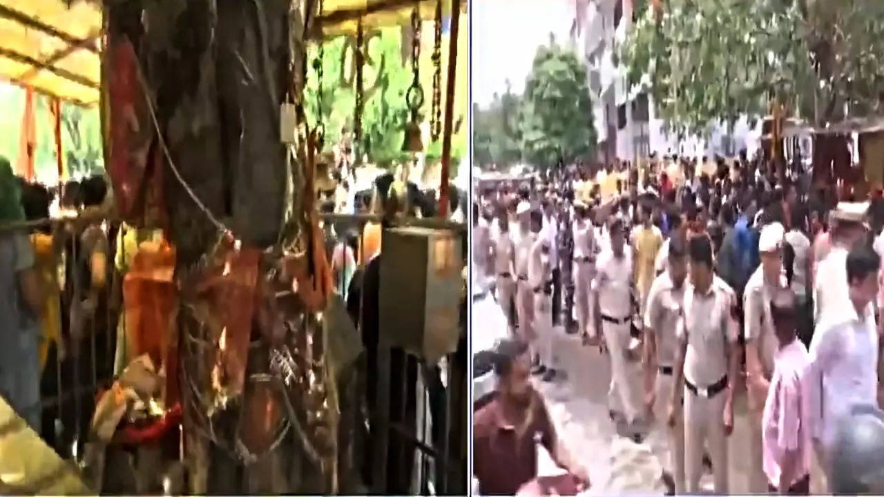 Devotees stage a protest outside a temple in Delhi's Mandawali