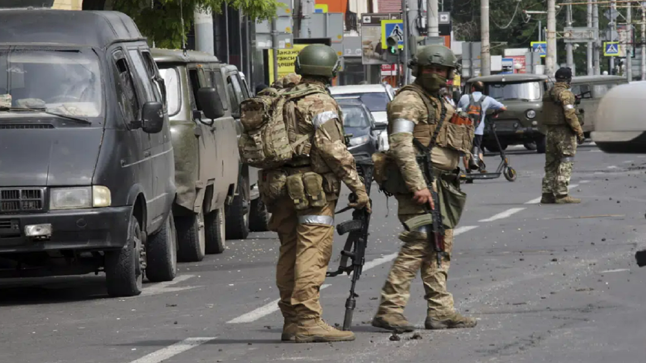 Russian servicemen guard an area in a street in Rostov-on-Don, Russia, Saturday, June 24, 2023.