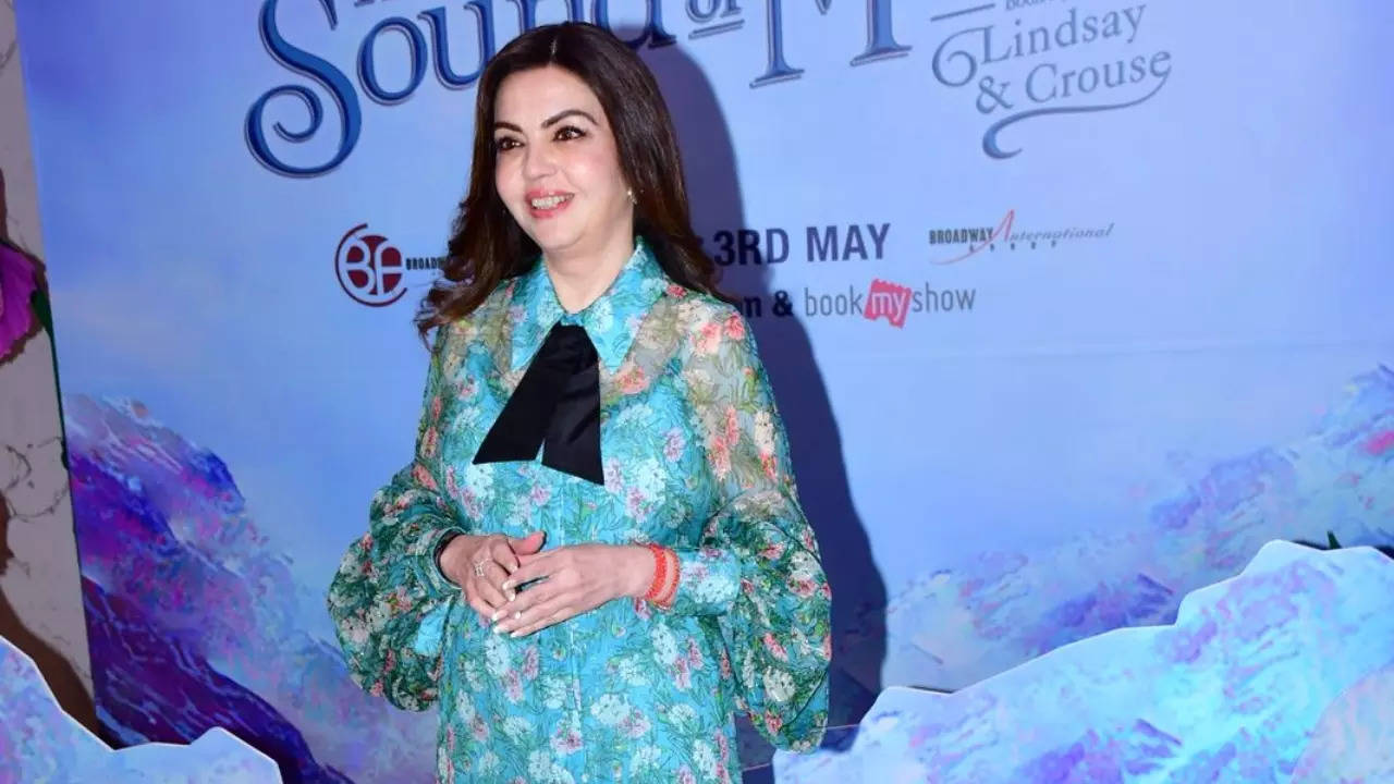 Nita Ambani looks elegant in blue floral print dress.