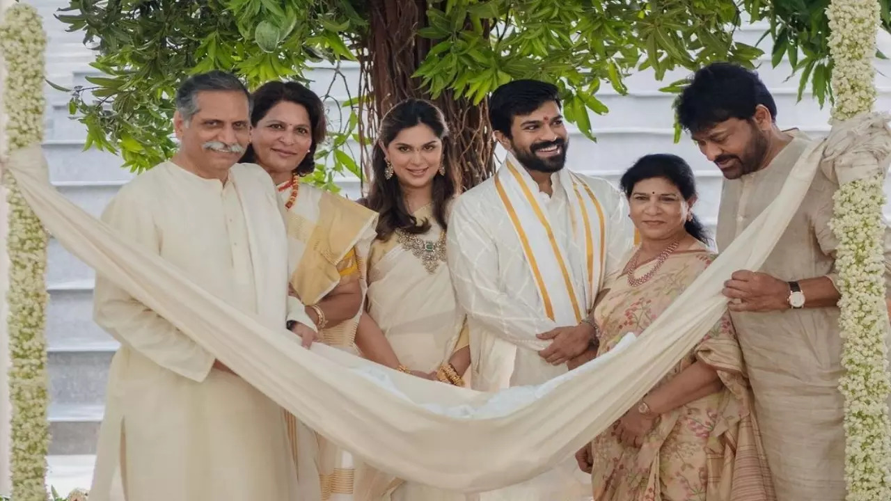 Upasana Kamineni and Ram Charan with family