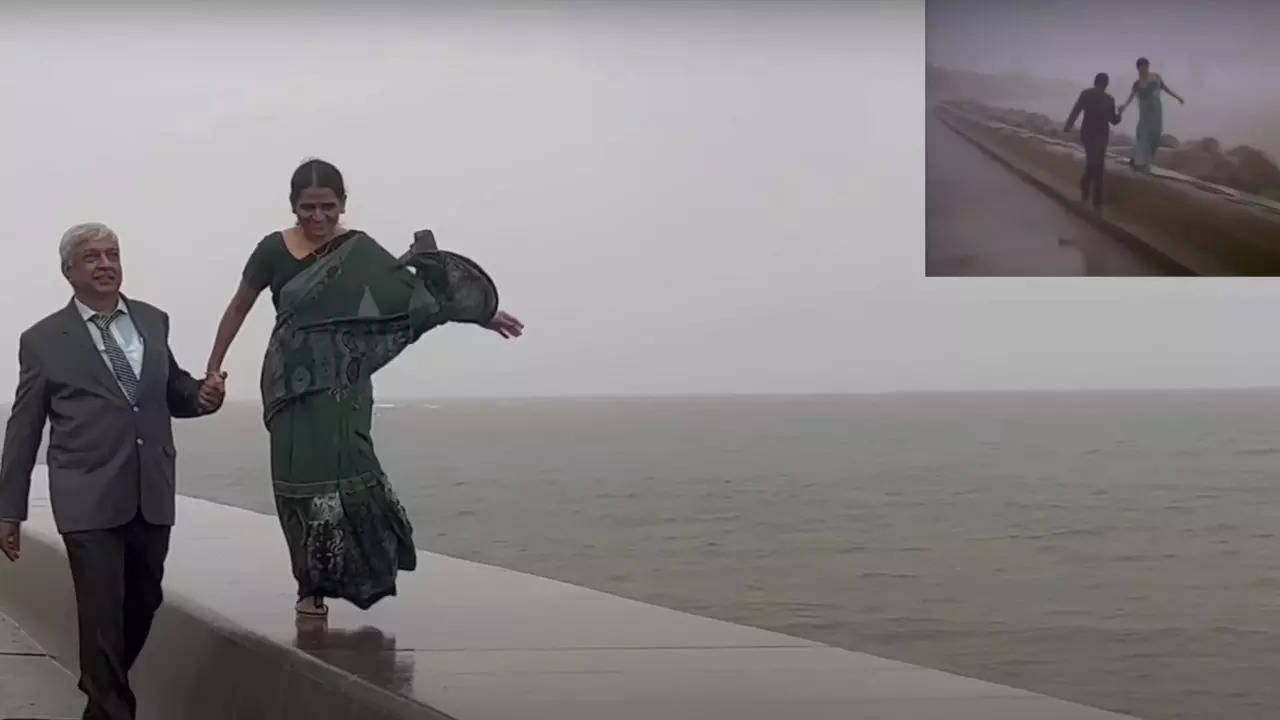 A couple recreates the song 'Rimjhim Gire Sawan' at Mumbai's Marine Drive, where the iconic rain melody was originally shot | Screenshot from Youtube video