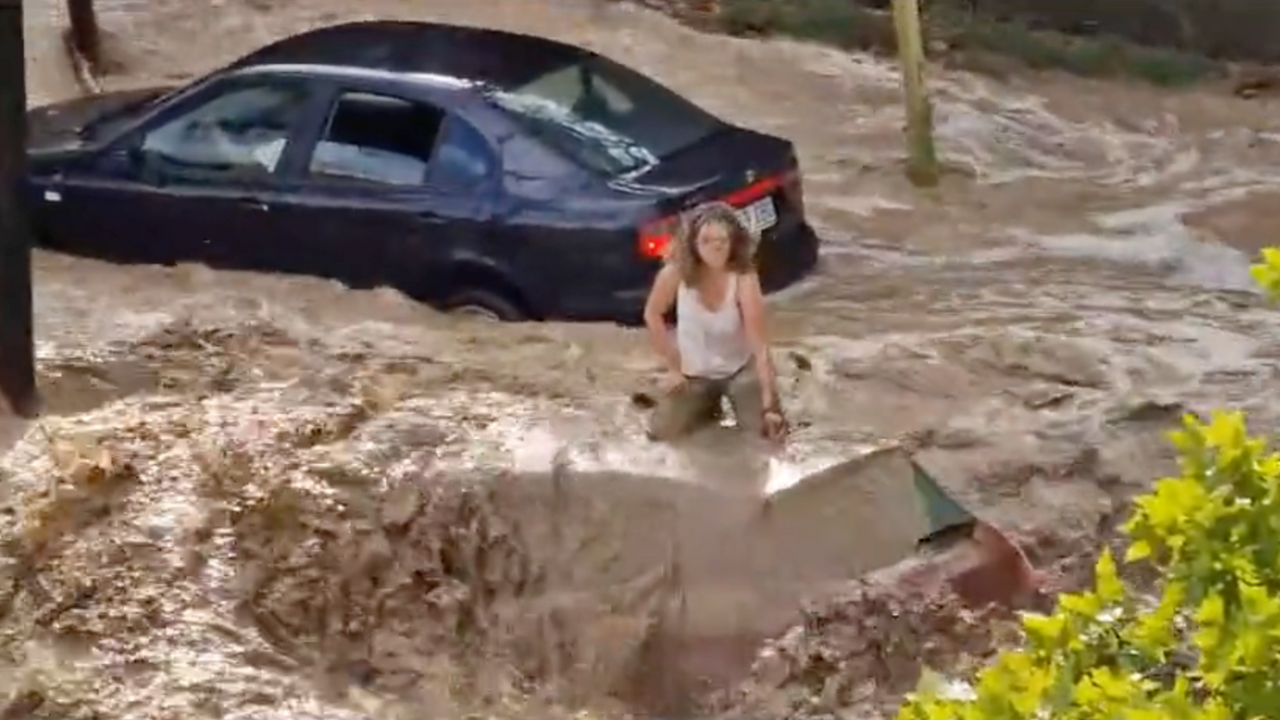 Spain Floods Leave Zaragoza Woman Stranded On Car Roof Until Rescue ...