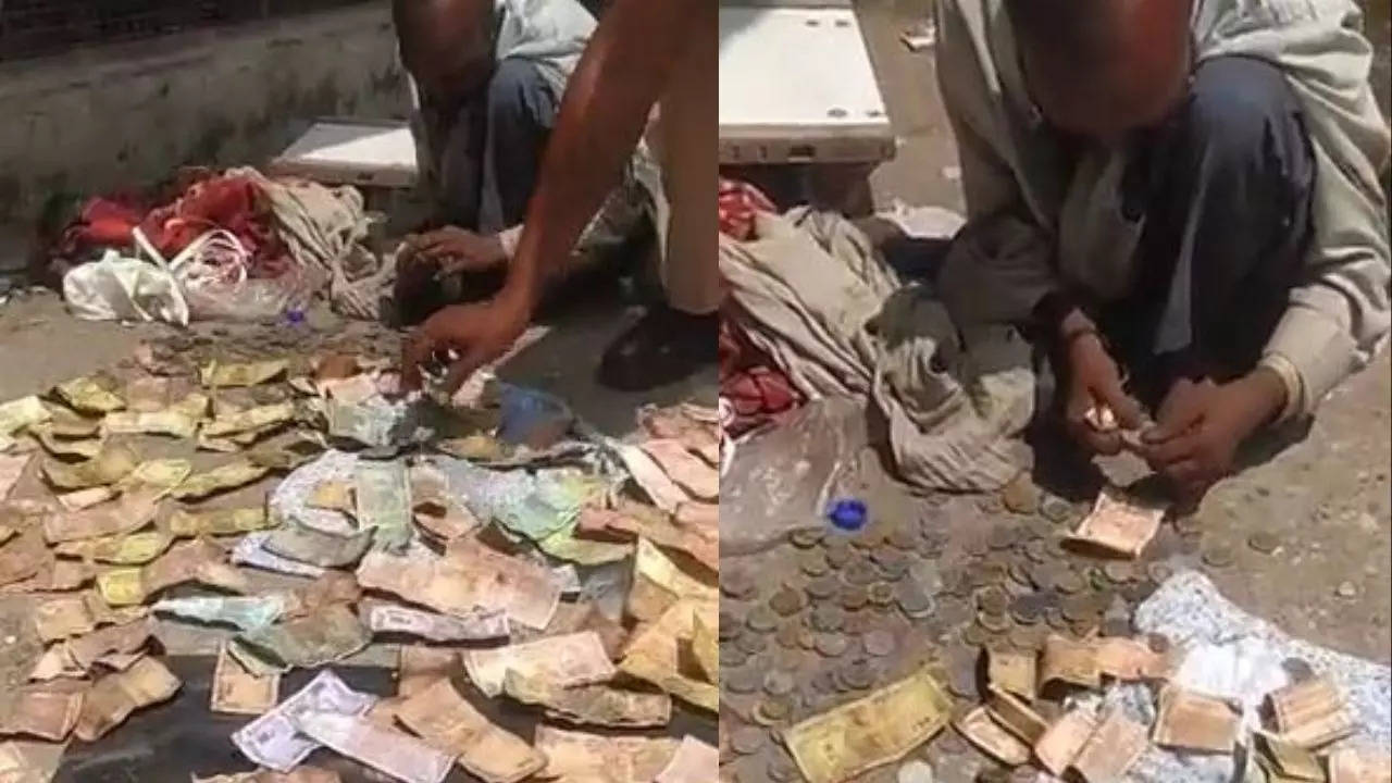 Cop Helps Homeless Man Dry Currency Notes After It Got Drenched In The ...