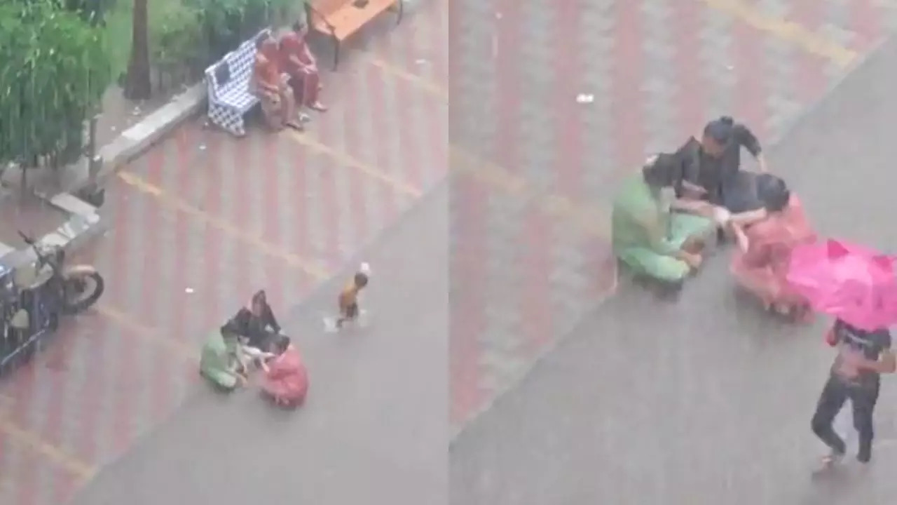 Women Gossiping in Heavy Rain (Image credit: Twitter/@swatic12)