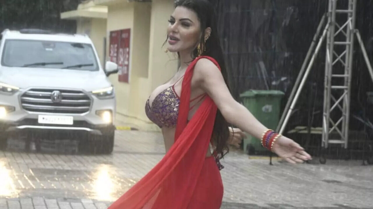 Kon Rakhi, Urfi? Sherlyn Chopra Dances In Rain, Raises Temperature In Red Saree With Plunging Neckline Blouse - Vimarsana News