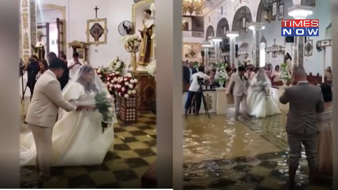 For Wetter, For Worse: Typhoon Doksuri Didn't Stop This Bride From Walking Down the Flooded Aisle