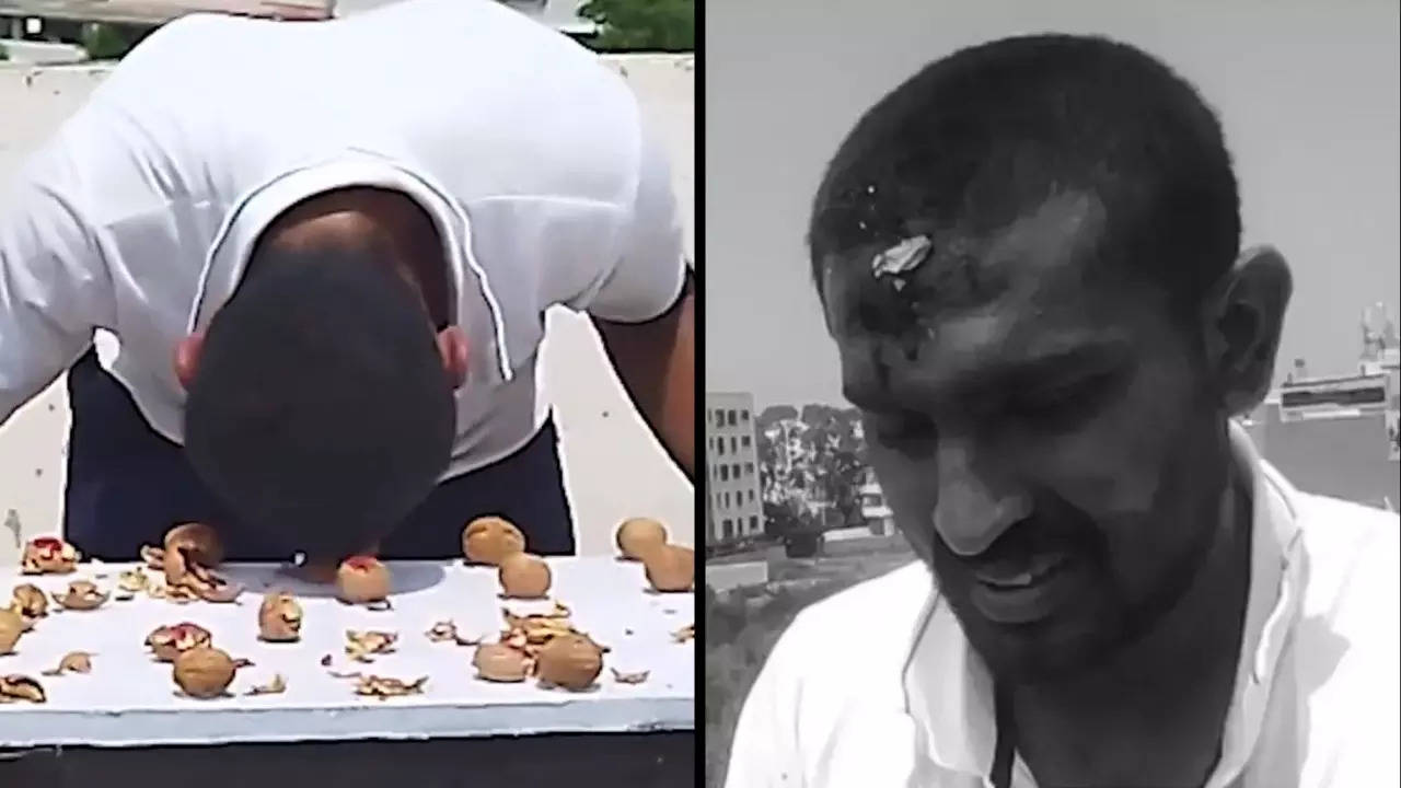 Indian martial artist Naveen Kumar reclaimed the title for most walnuts cracked with the head in one minute. | Image courtesy: Guinness World Records