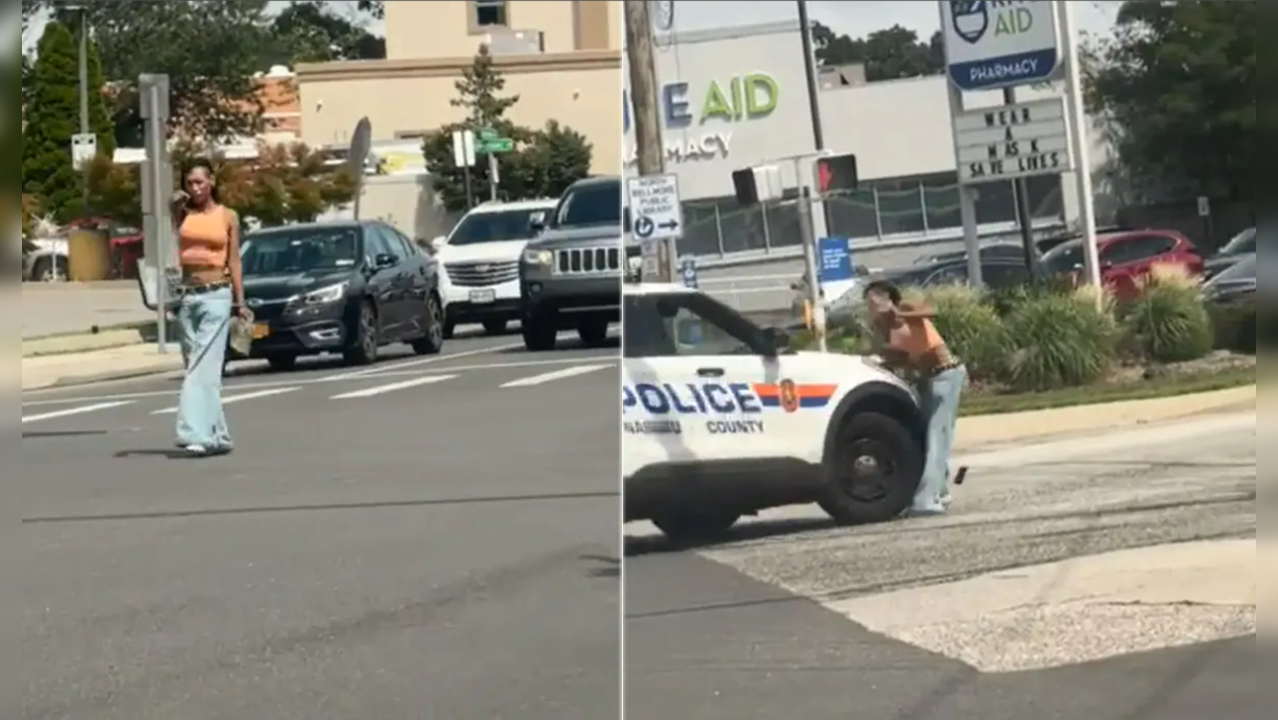 US Woman Pointing Gun At Traffic Hit By Police Car