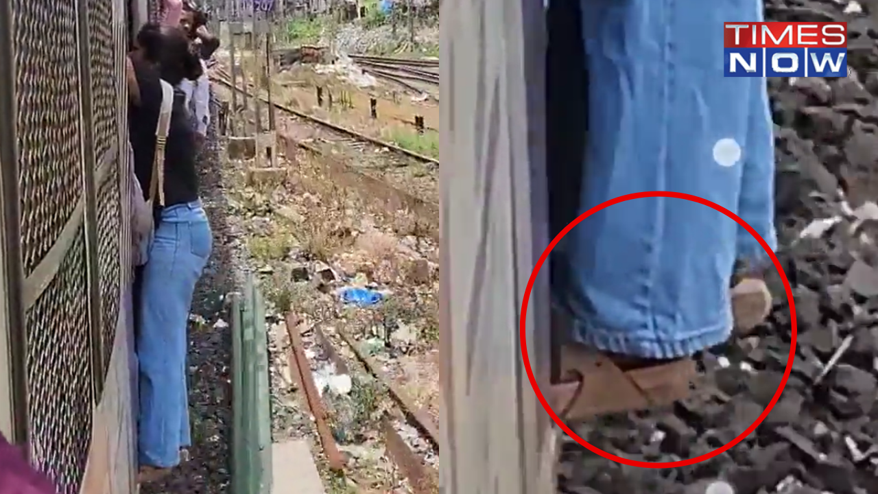 Video of Woman Entirely Hanging Out Of Moving Mumbai Local Goes Viral