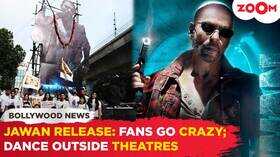 Jawan release Fans go crazy SRK fans dance outside theatres pours milk on his poster